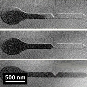 The pinning of a magnetic domain wall.